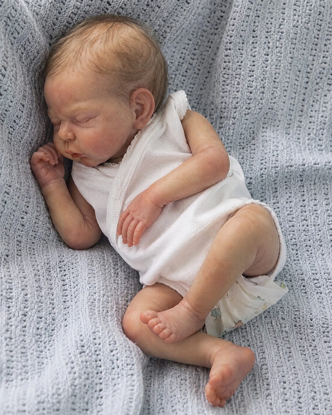 Muñeco Reborn Realista Rafiki Niño 42cm y 1.200 kg